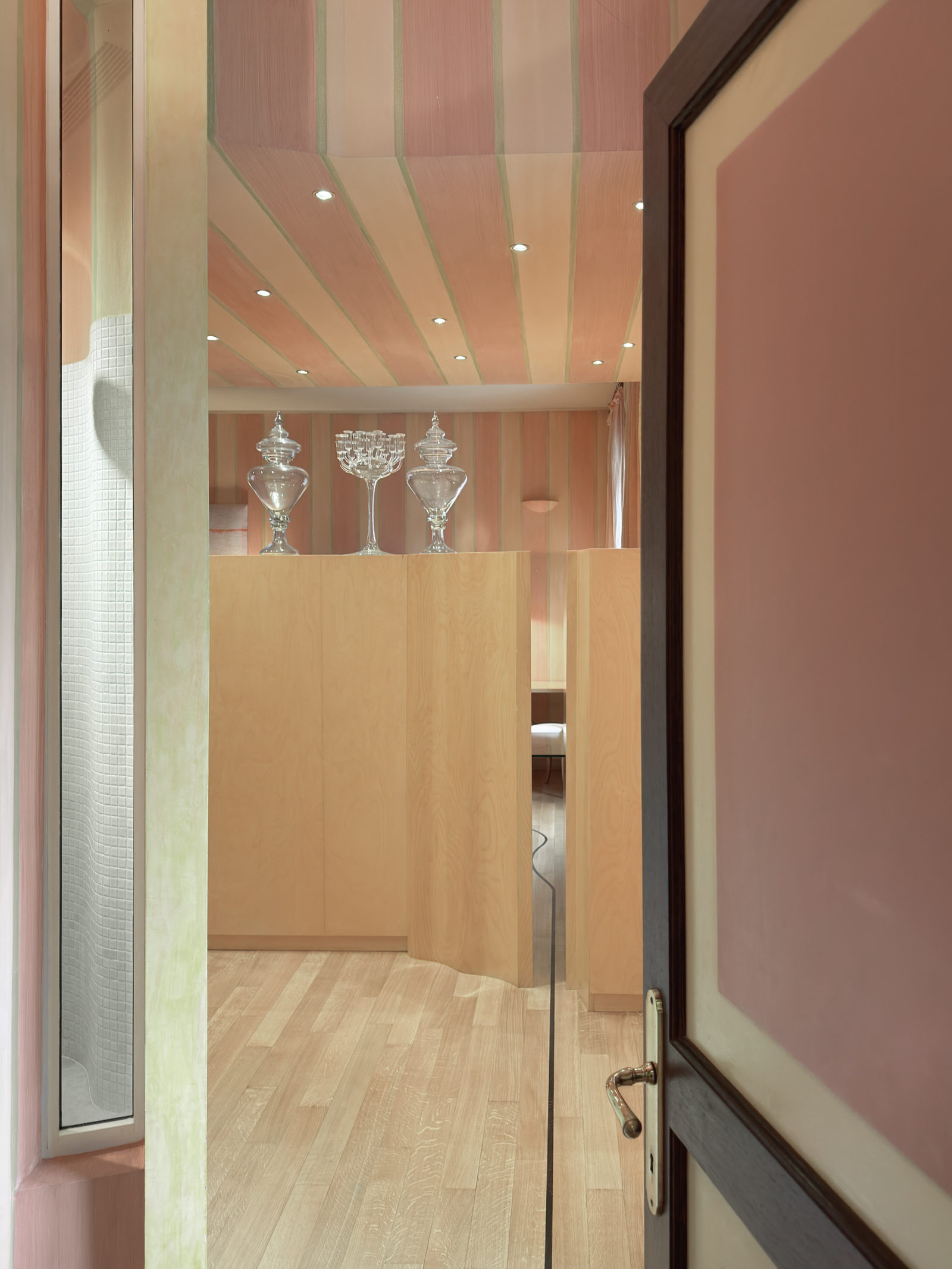 Hand-finished interior with striped marquetry ceiling and Murano glassware