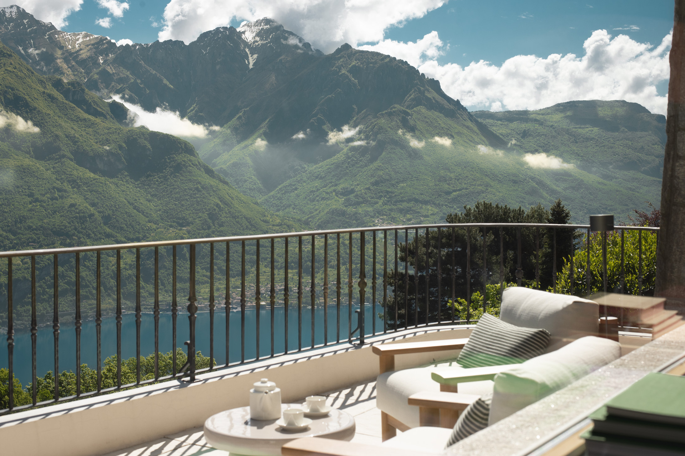 Terrace lounge with tea overlooking Lake Como and the mountains