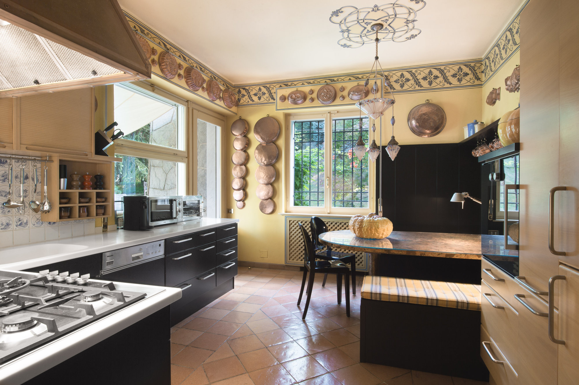 Kitchen with hanging copper moulds
